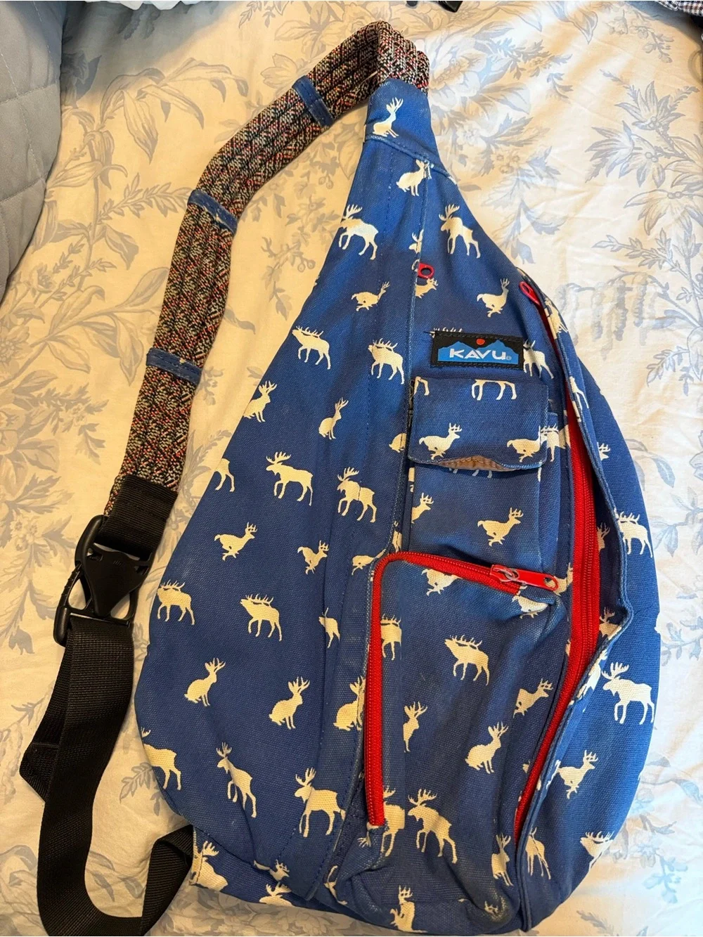 Kavu Blue Moose Print Sling with Red Zipper Accents